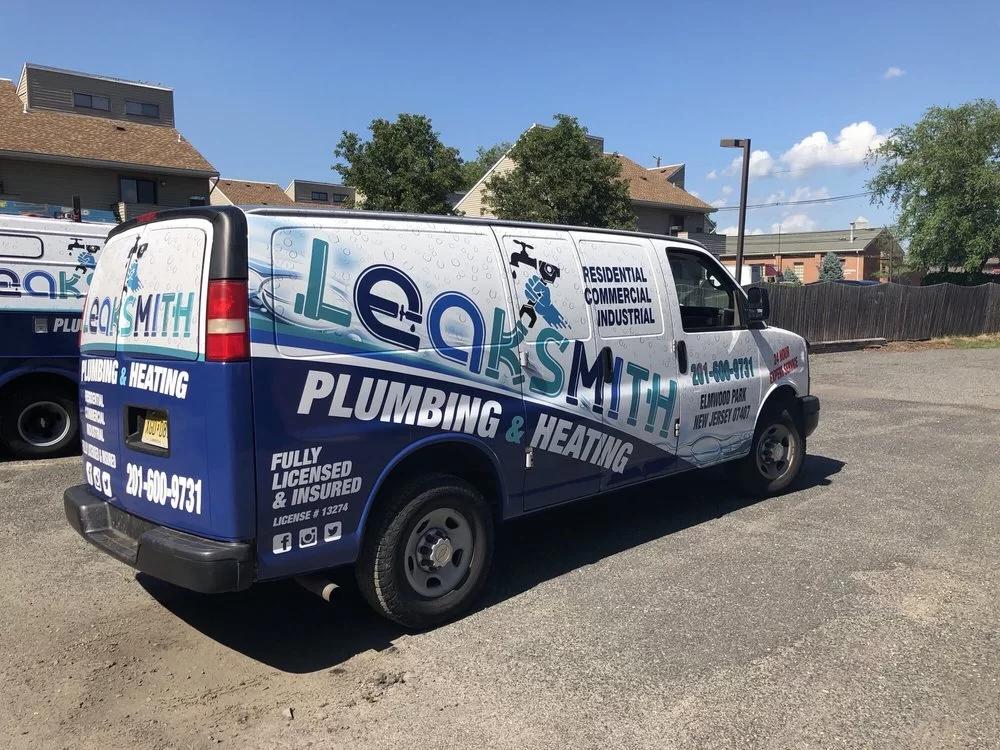 leaksmith branded truck on service call